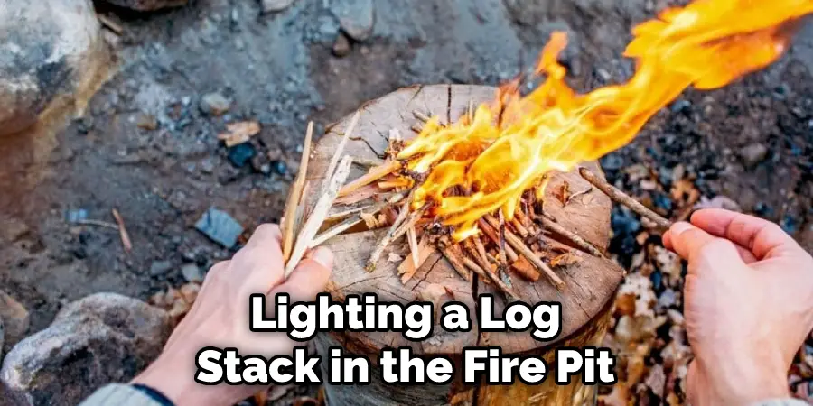 Lighting a Log Stack in the Fire Pit