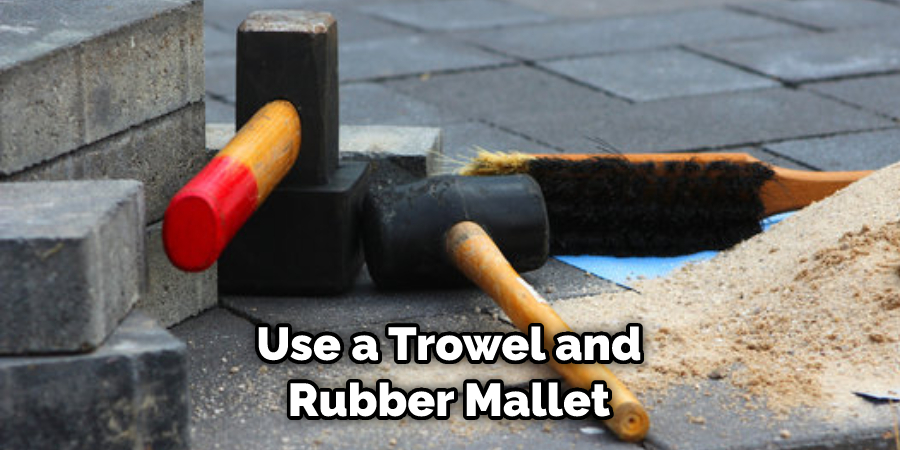 Use a Trowel and Rubber Mallet