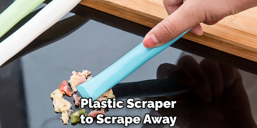 Plastic Scraper to Scrape Away 