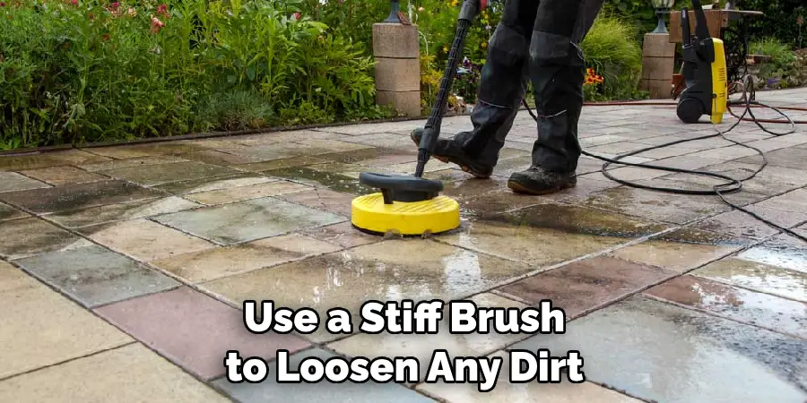  Use a Stiff Brush 
to Loosen Any Dirt