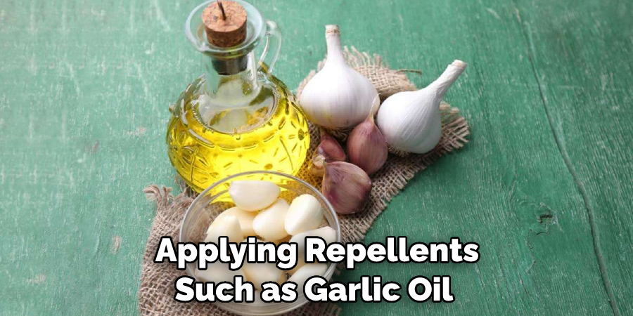 Applying Repellents Such as Garlic Oil 