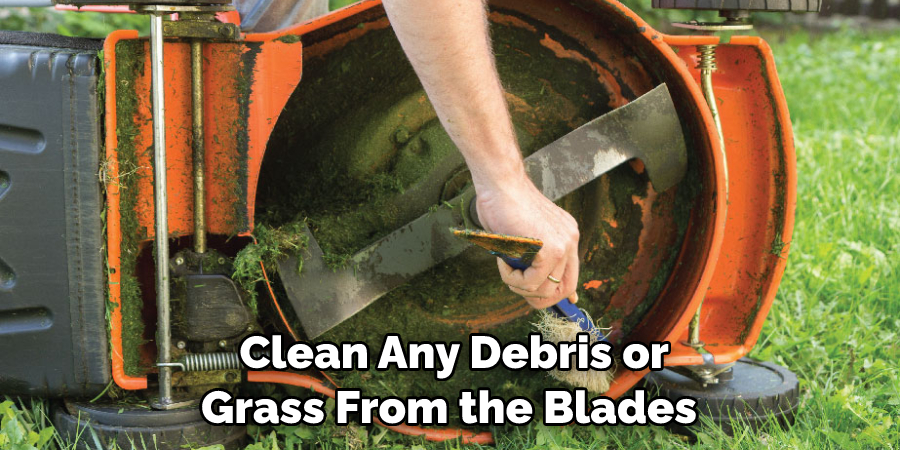 Clean Any Debris or Grass From the Blades