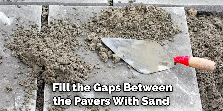 Fill the Gaps Between the Pavers With Sand