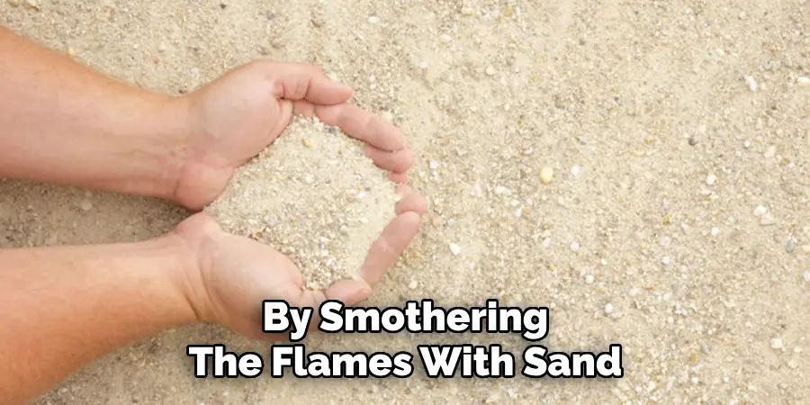 By Smothering The Flames With Sand