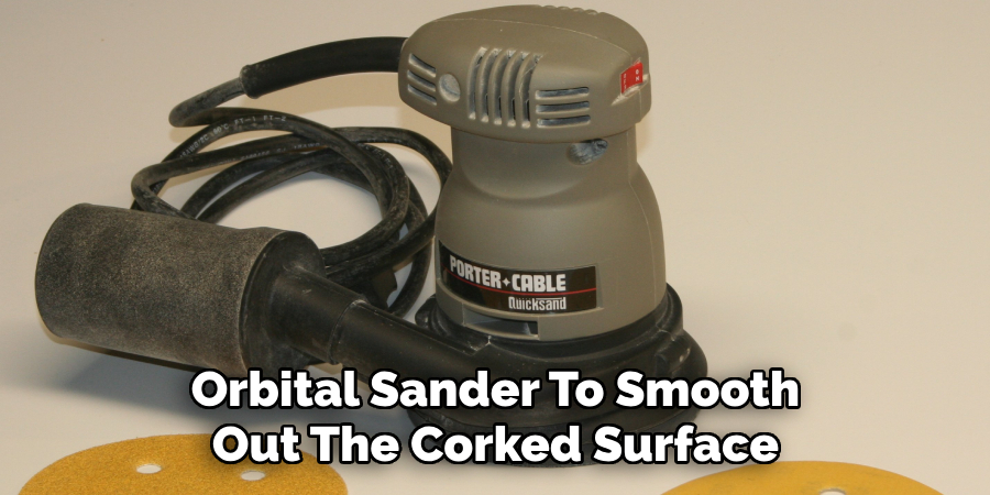 Orbital Sander To Smooth Out The Corked Surface