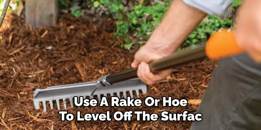 Use A Rake Or Hoe To Level Off The Surfac