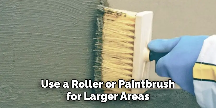 Use a Roller or Paintbrush for Larger Areas 