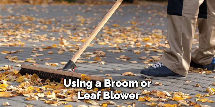 Using a Broom or Leaf Blower