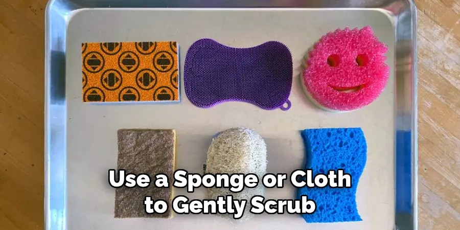  Use a Sponge or Cloth to Gently Scrub