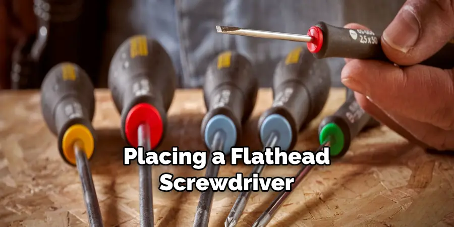 Placing a Flathead Screwdriver