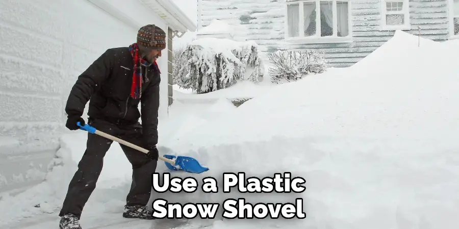 Use a Plastic Snow Shovel