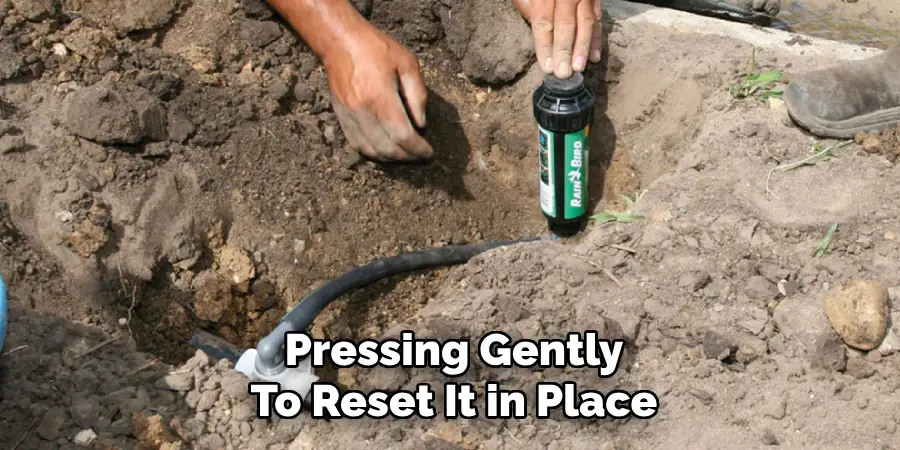 Pressing Gently
To Reset It in Place