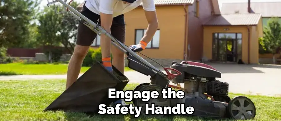 Engage the
Safety Handle