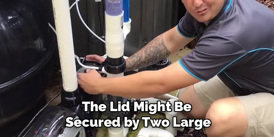 The Lid Might Be 
Secured by Two Large