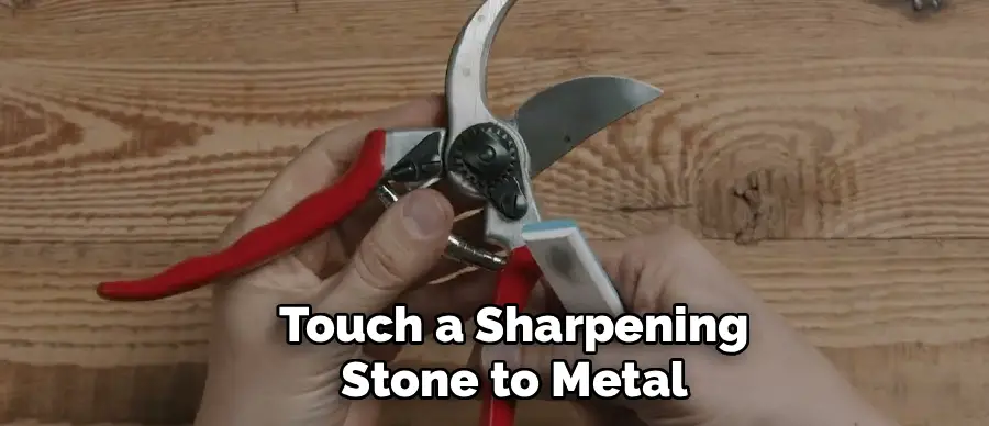 Touch a Sharpening Stone to Metal