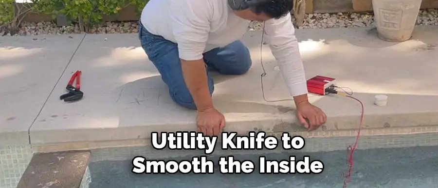 Utility Knife to
Smooth the Inside