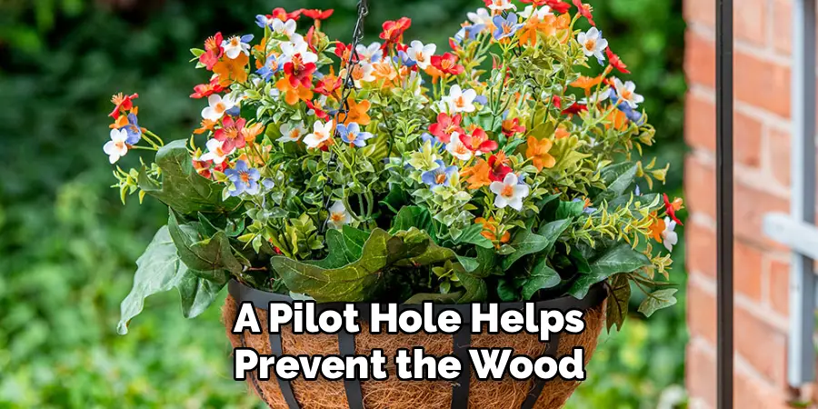 A Pilot Hole Helps
Prevent the Wood