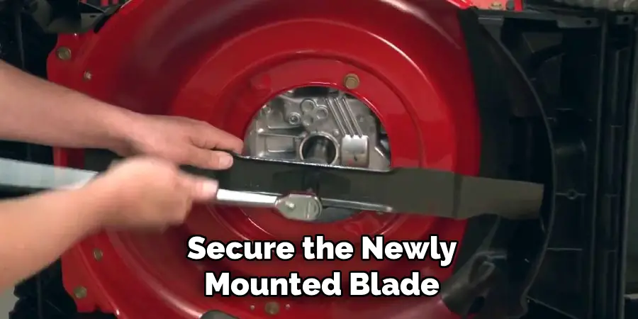 Secure the Newly
Mounted Blade
