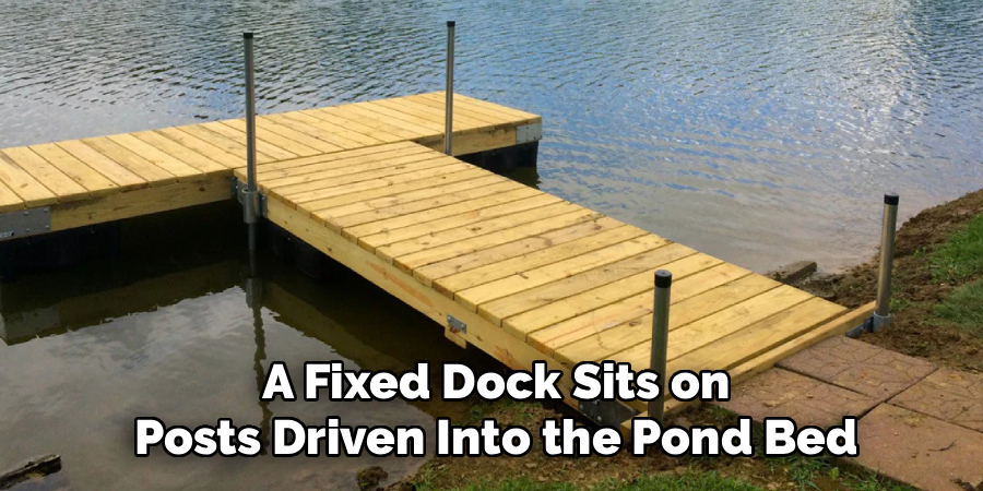 A Fixed Dock Sits on
Posts Driven Into the Pond Bed