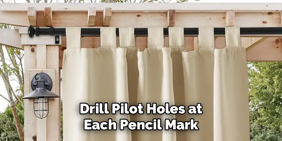 Drill Pilot Holes at
Each Pencil Mark