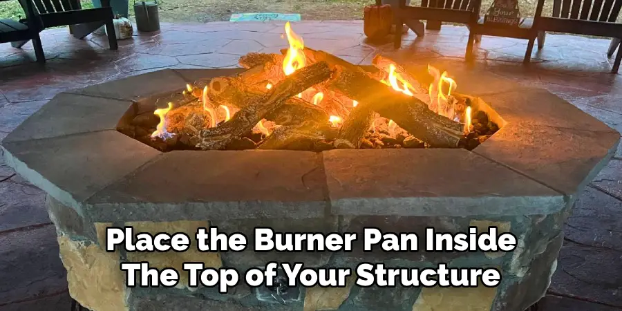 Place the Burner Pan Inside
The Top of Your Structure