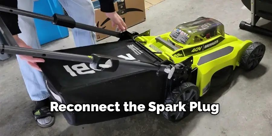Reconnect the Spark Plug