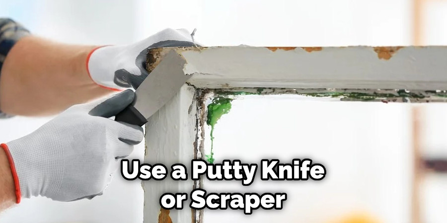 Use a Putty Knife or Scraper