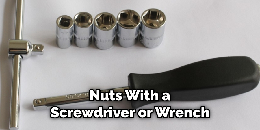Nuts With a Screwdriver or Wrench.