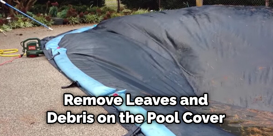 Remove Leaves and Debris on the Pool Cover