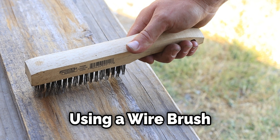 Using a wire brush